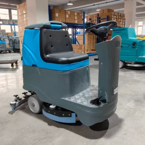 Battery-Powered Electric Ride-On Floor Scrubber for Garage Tile Cleaning