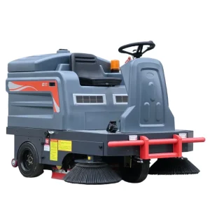 Compact Battery-Powered Ride-On Floor Sweeper for Leaf Collection and Road Cleaning