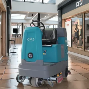 Compact Commercial and Industrial Ride-On Electric Floor Scrubber with Double Scrubbing