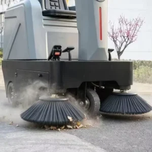 Industrial Ride-on Floor Sweeper with Dual Side Brushes Dust Collection System for Commercial Cleaning Applications