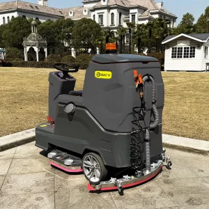 Ride-On Floor Sweeper with Rear Drive Axle Motor and Brush Compression Function