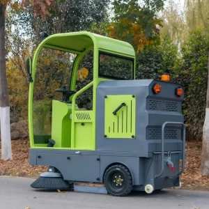 Small Ride-On Motorized Brush Vacuum Sweeper for Construction Sites, Farms, and Streets